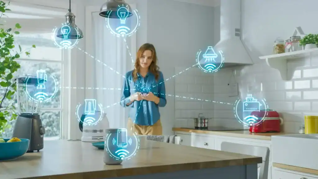 Kobieta w inteligentnej kuchni sterująca urządzeniami smart home – podłączone blender, ekspres, czajnik, oświetlenie i okap